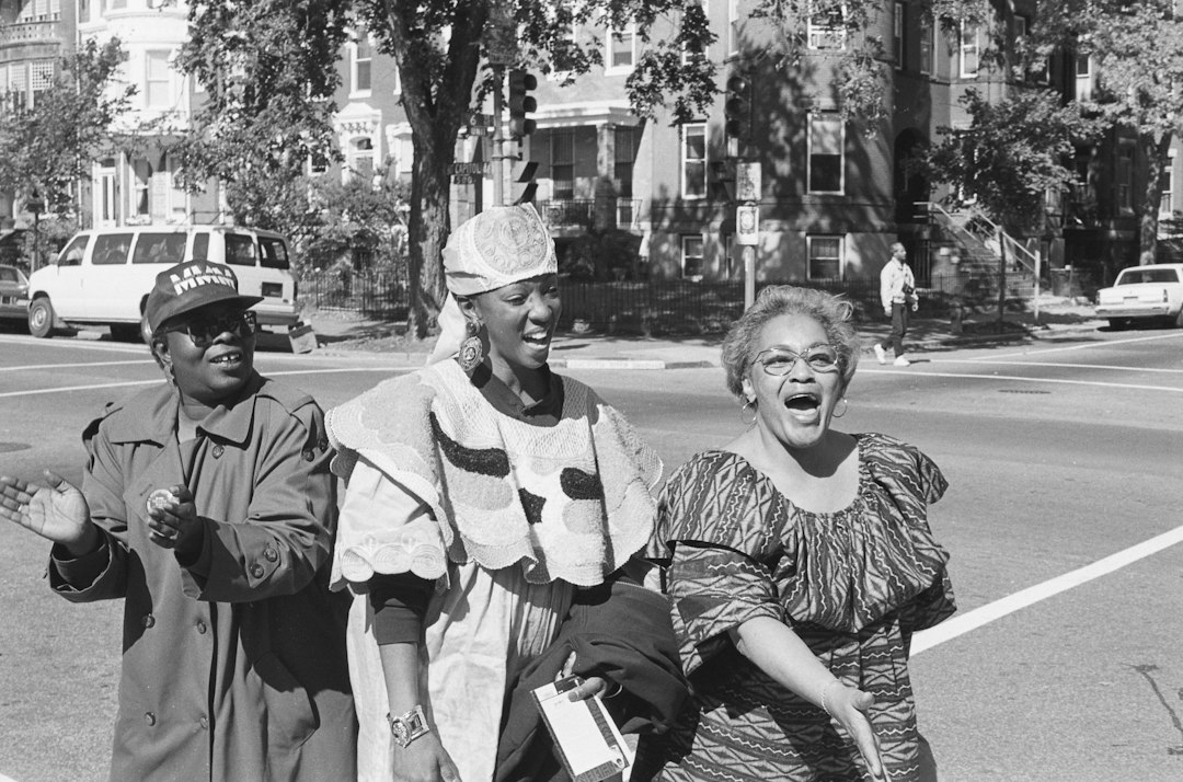 Historical photograph of three Black women walking together in Washington, D.C., in 1965; people pictured are not Winn-Wright clients.